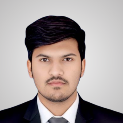 Professional headshot of a young man in formal attire.